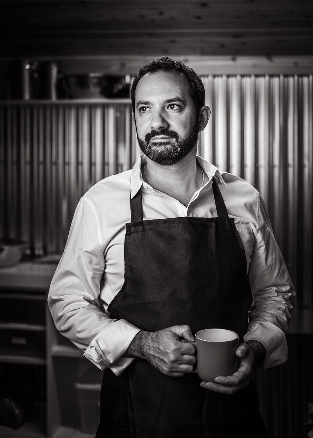Personal branding portrait of man with a cup of coffee