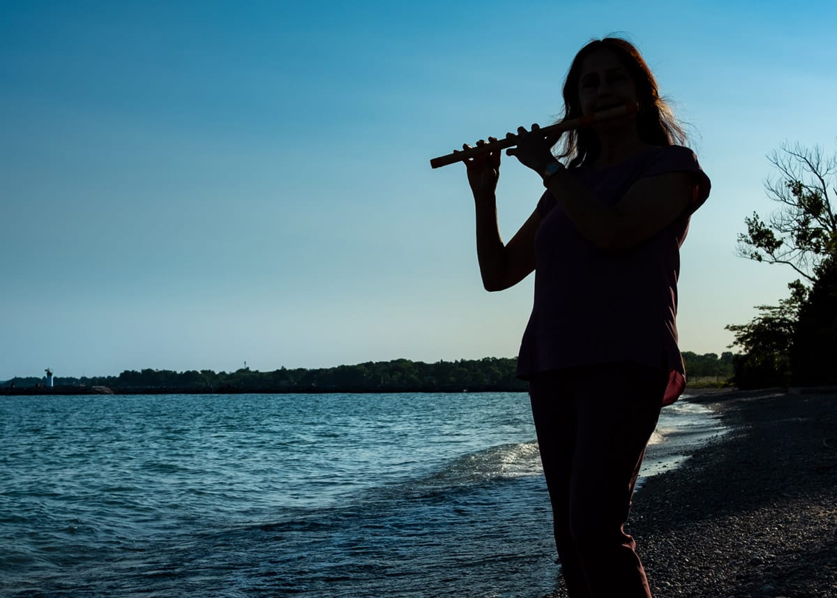 personal branding photo of a lady playing the flute