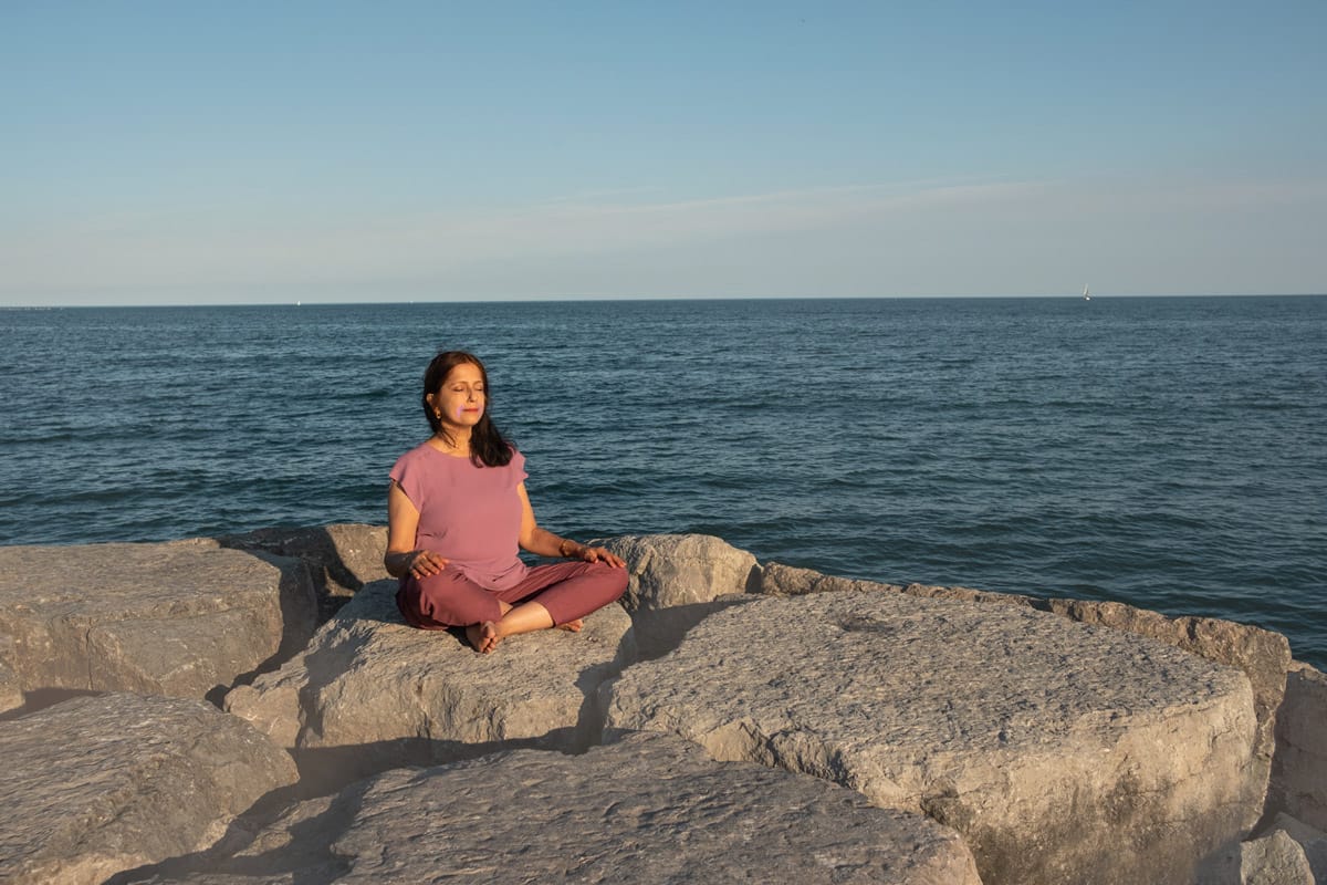 personal branding photo of a yoga instructor meditating