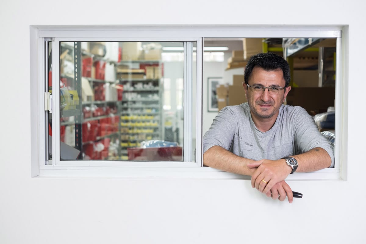 Corporate and professional portrait of a man in a window