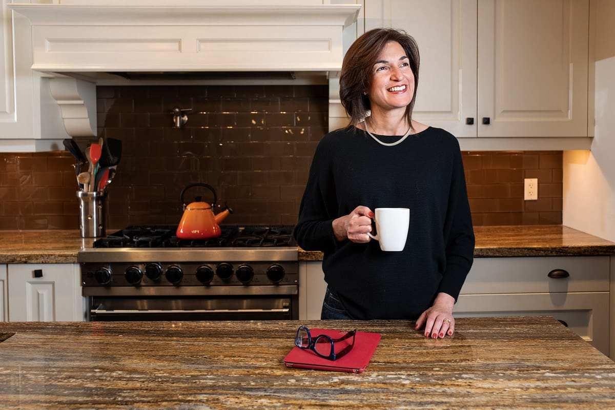 personal branding photo of a woman holding a cup of coffee