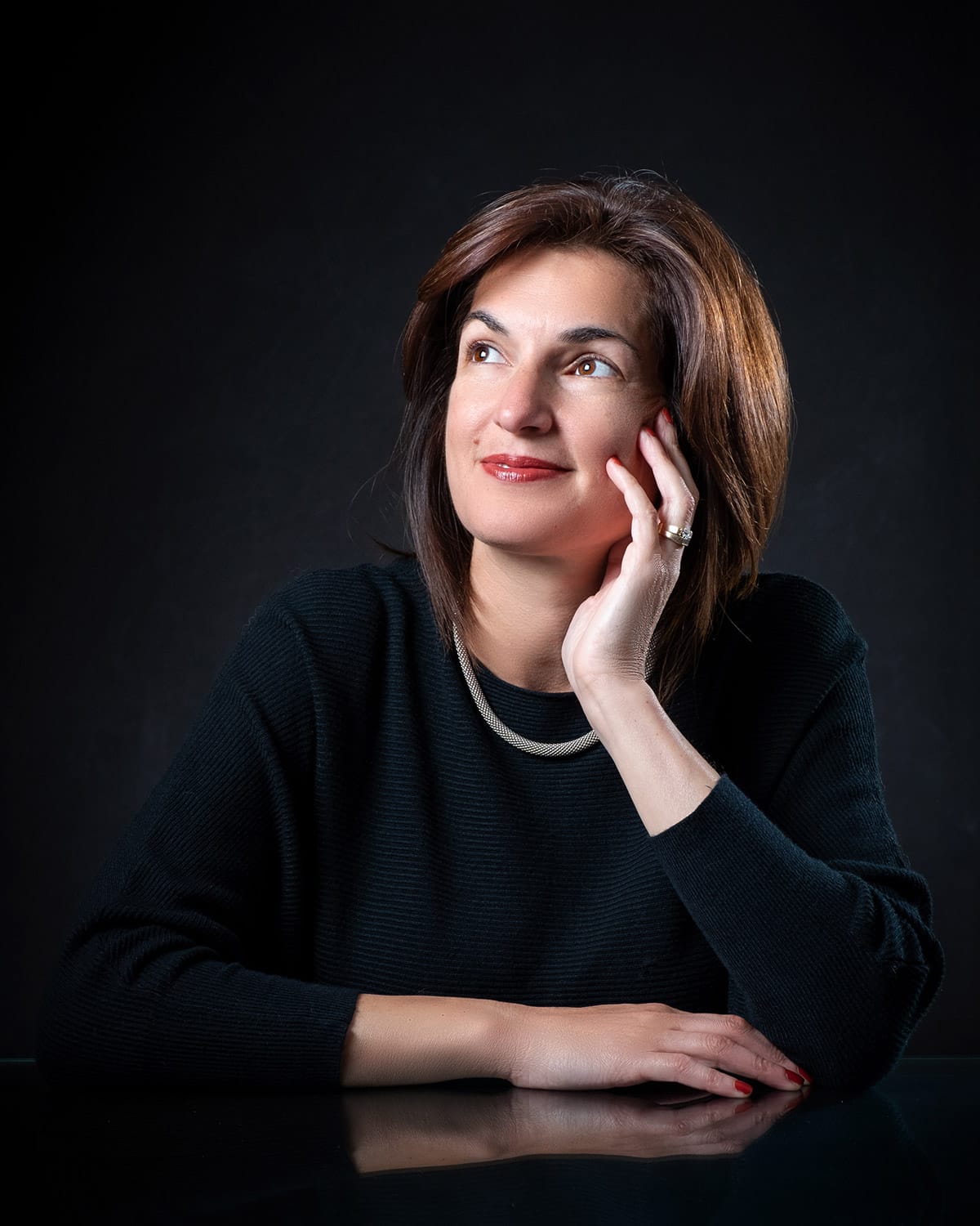 personal branding photo of a woman looking into the light
