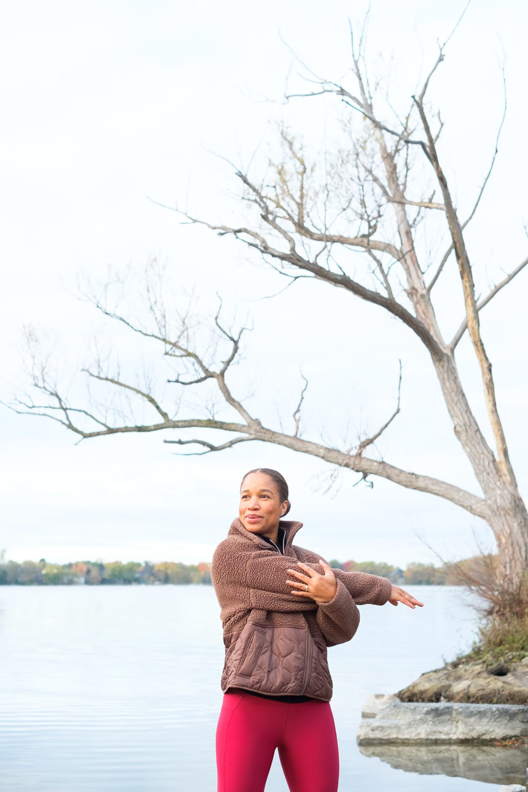Portrait of Chloe warming up/down and stretching.