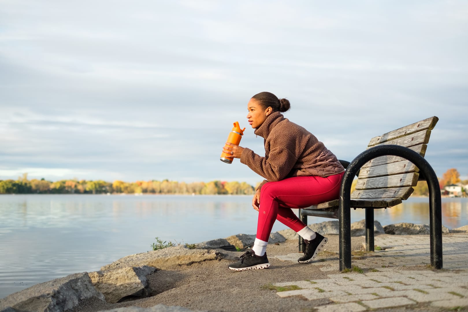 A portrait of Chloe at the park incorporating hydration.